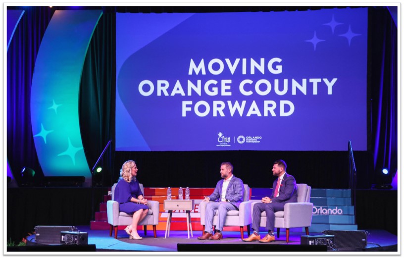 Casandra Matej, president and CEO at Visit Orlando, discussing the transportation tax initiative with Tim Giuliani, president and CEO at Orlando Economic Partnership, and Robert Agrusa, president and CEO at the Central Florida Hotel and Lodging Association.