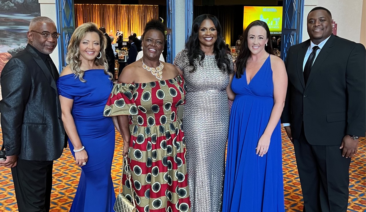 Visit Orlando team members pictured with Tanisha Nunn Gary, President at African American Chamber of Commerce of Central Florida (AACCCF), and Benjamin Parker, Walt Disney World, at the AACCCF's Eagle Awards. 