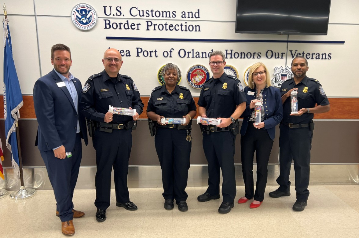 Visit Orlando team members pictured with the U.S. Customs and Border Protection team. 